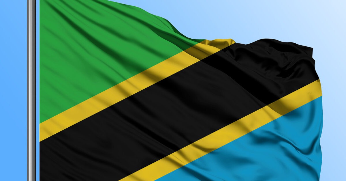 tanzania-flag-waving-in-the-deep-blue-sky-background-isolated-national-flag-macro-view-shot