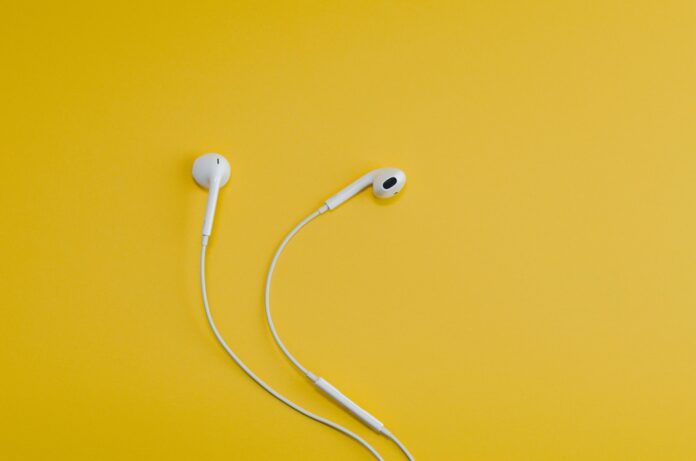 Photo by Math Apple EarPods on yellow surface
