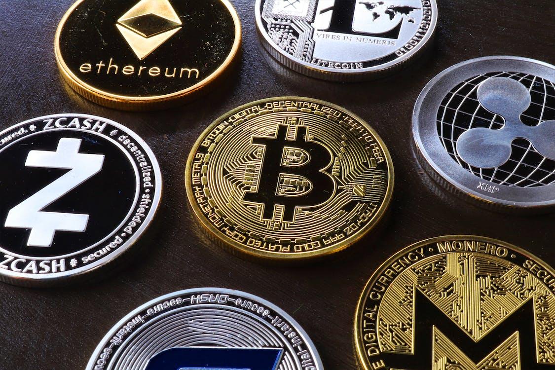 Free Various Cryptocurrency on Table Stock Photo