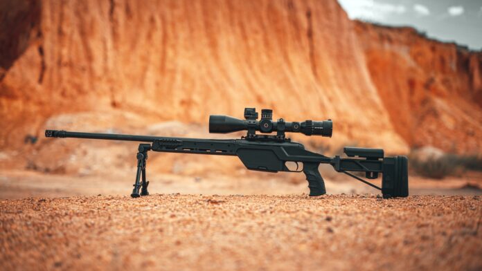Photo by maxzzerzz ❄ black rifle on brown sand
