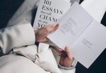 Top 10 Reasons To Hire Essay Writing Services person holding book