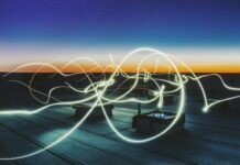 Energy Management Systems: Optimizing Efficiency and Sustainability time lapse photography of square containers at night