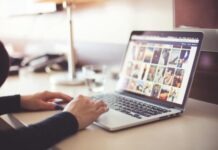 Person Using Laptop Computer during Daytime