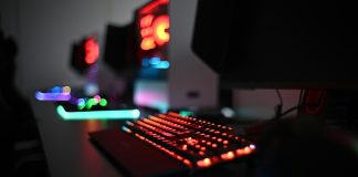 a computer keyboard sitting on top of a desk